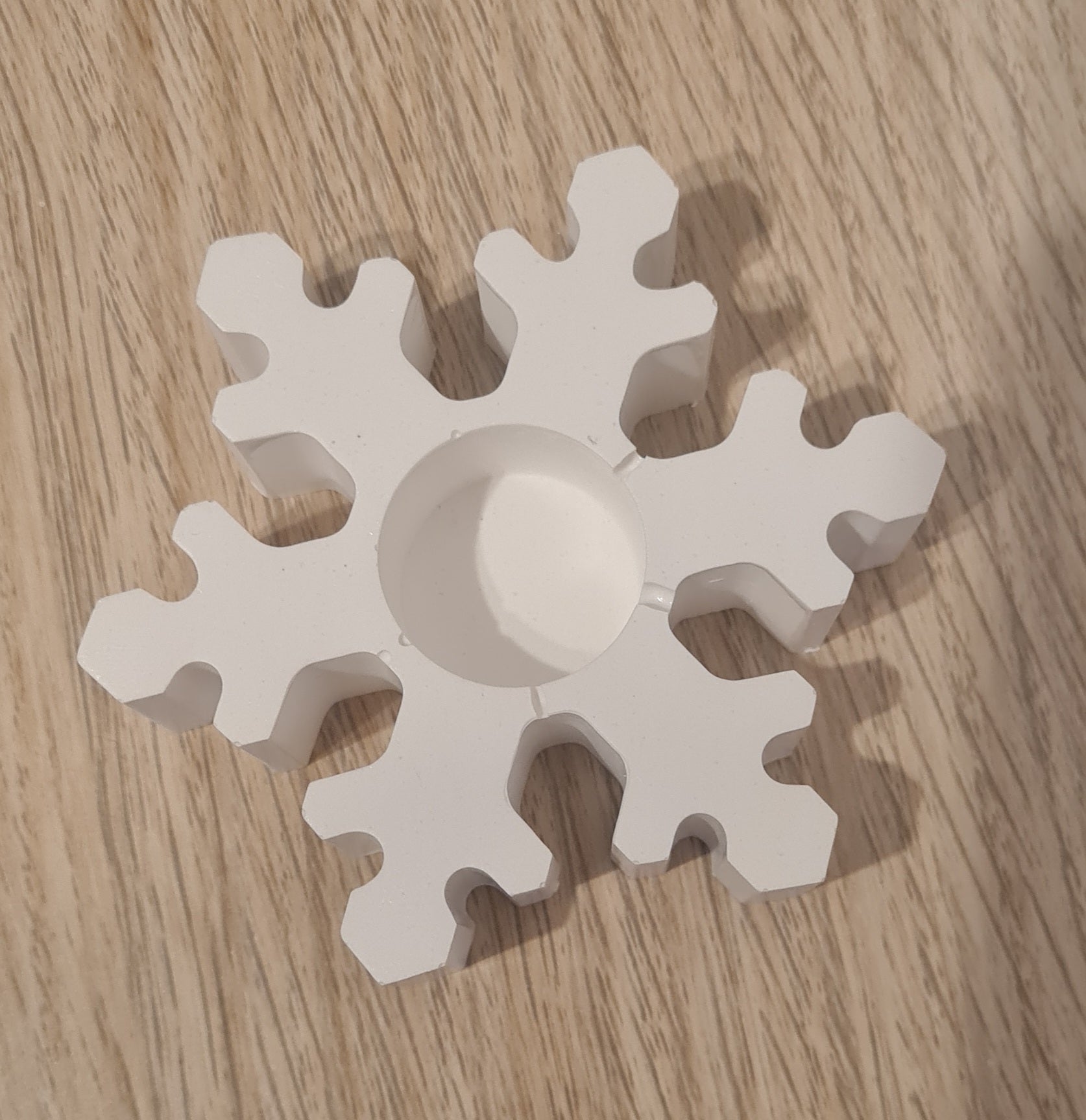 Schneeflockenständer